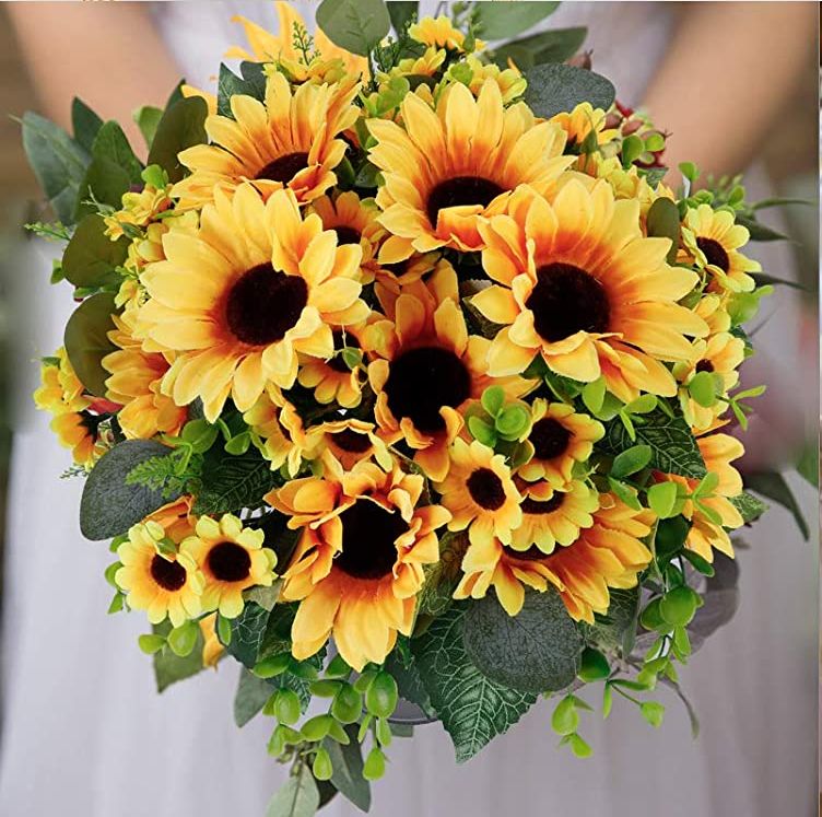 This beautiful bouquet of silk sunflowers is yours to use when you say your vows at Rock Spring and choose wedding packages three or four.